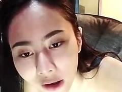 Thai babe shows her big tits in a webcam erotica